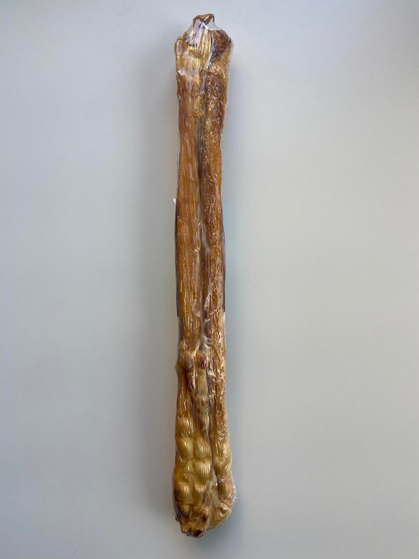 Kaninskind med pels rullet, ca. 40. cm.